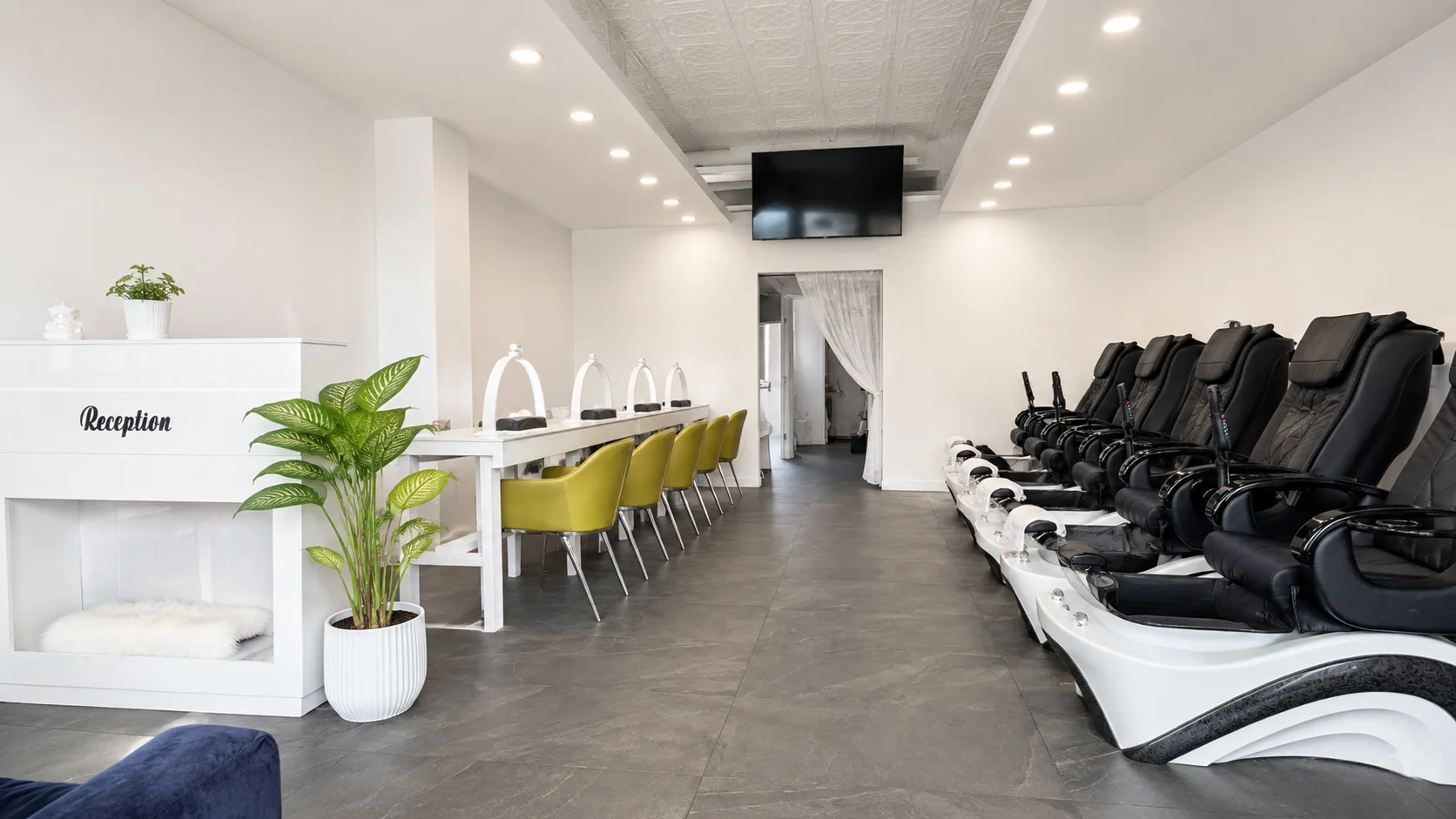 Wide view of the V Nails Lacombe salon interior